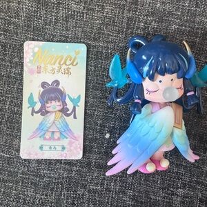 Nanci Blue and Pink Figurine